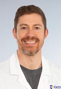 Thomas George, PT,  DPT,  COMT